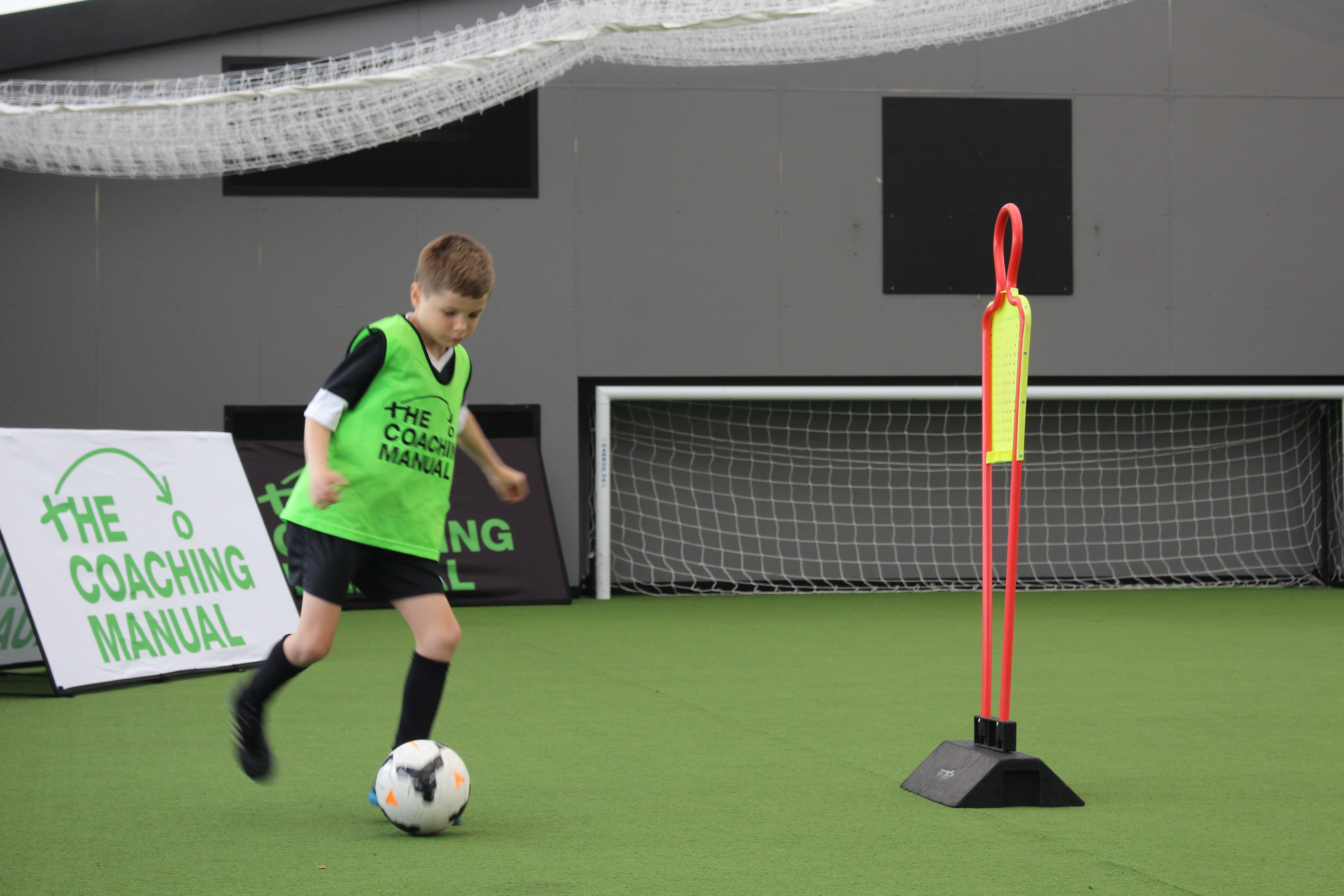 Child playing soccer